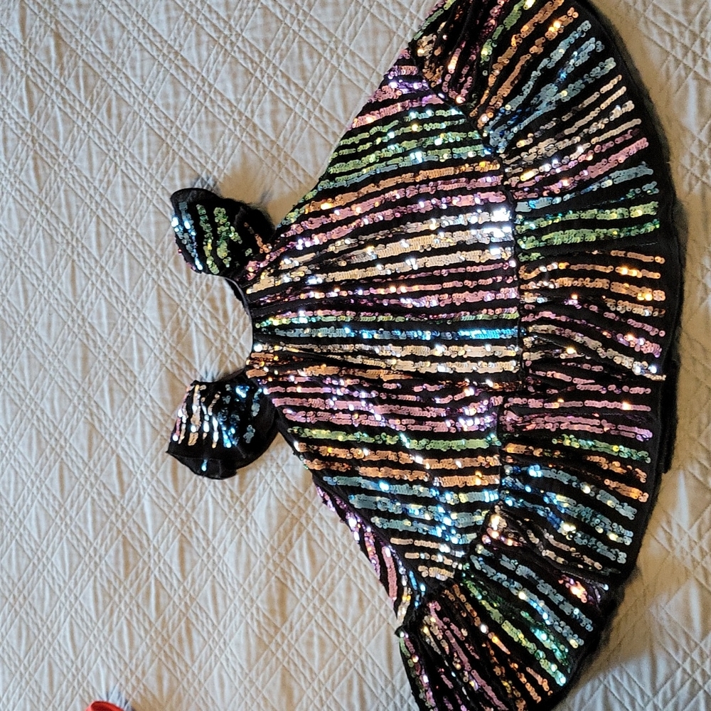 Twirling sparkling sequin dress